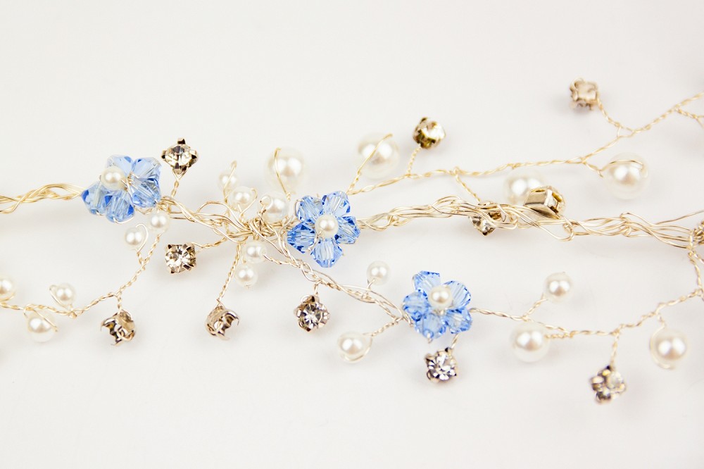 Close up image of forget me now bridal hair accessory