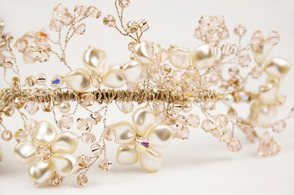 Close up photo of peaches and cream bridal tiara