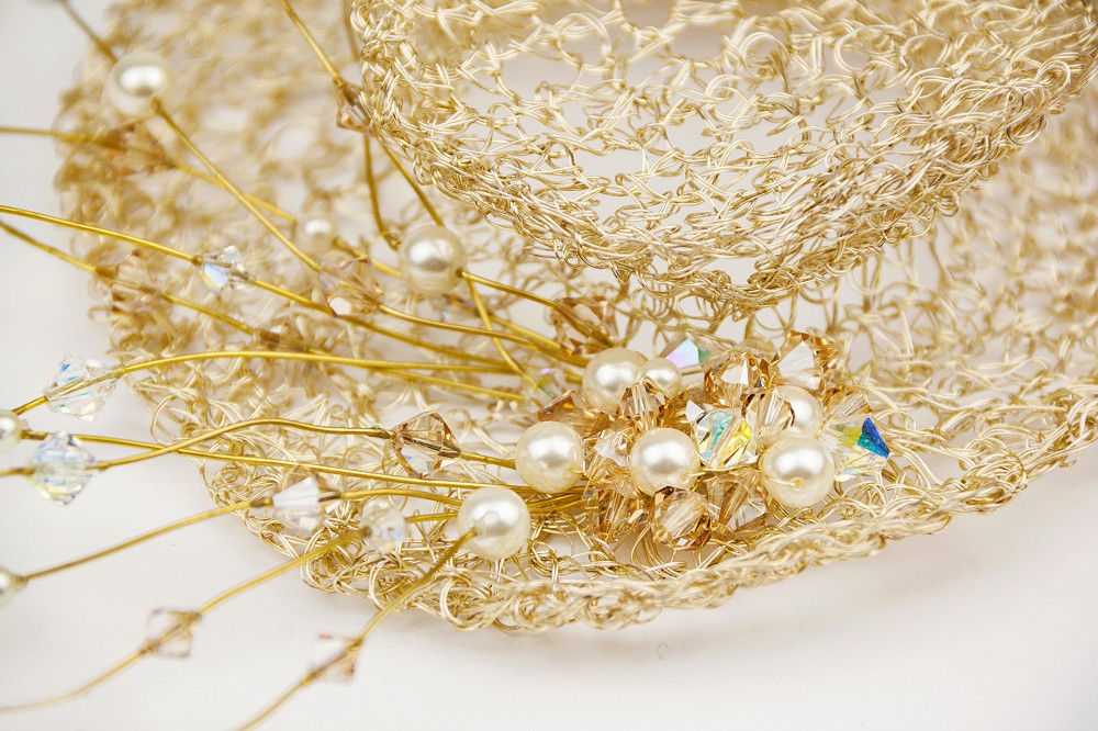 Close up of mother of the bride hat