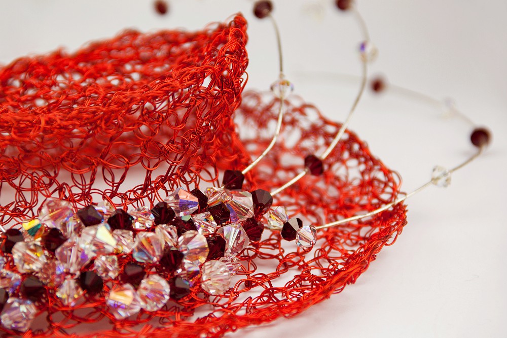 Close up of red wedding hat