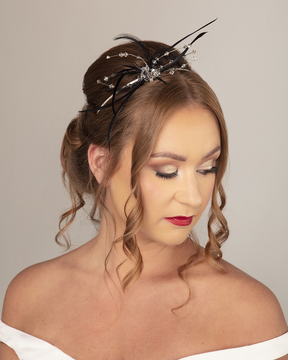 Mother of the bride headpiece in black